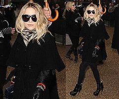 Mary-Kate Olsen at London Fashion Week Wearing Black Cape Coat and Blue Proenza Schouler Clutch Mary-Kate Olsen at London Fashion Week Wearing Black Cape Coat and Blue Proenza Schouler Clutch