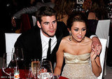 Liam Hemsworth and Russell Brand?  OH MY!