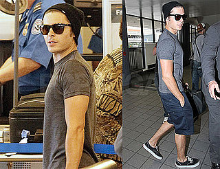 Pictures of Zac Efron Leaving LAX in Shorts and a Gray Tee
