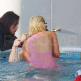 Guess Who's in a Hot Tub With Her Clothes On?