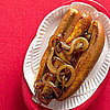July Fourth Recipe For Cheese-Stuffed Hot Dogs with Spicy Onions