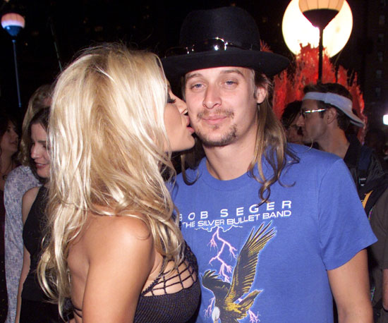 Pamela Anderson planted a kiss on Kid Rock backstage at the VMAs in 2001.
Pamela Anderson planted a kiss on Kid Rock backstage at the VMAs in 2001.