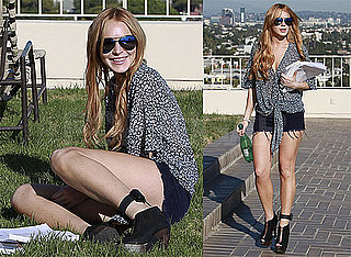 Pictures of Lindsay Lohan Wearing Her SCRAM Bracelet While Reading a Script in LA