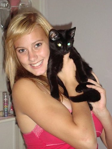 Our new kitty, Jolie with one of my girls