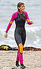 Pictures of AnnaLynne McCord Donning a Body-Skimming Wetsuit For a Surf Lesson on the 90210 Set