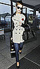 Pictures of Emma Watson At Heathrow Airport In A Burburry Mac With Leather Sleeves After Harry Potter and the Deathly Hallows