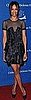 Pictures of Zoe Saldana in Black Ruffled Dress