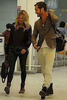 Pictures of Jude Law and Sienna Miller at Heathrow After Nairobi New Year's Holiday