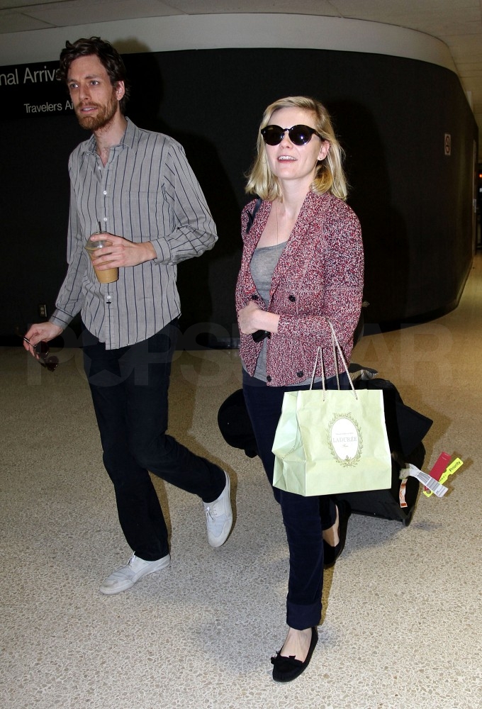 Kirsten Dunst Returns From Her Couture Adventures to Her Boyfriend Kirsten Dunst Returns From Her Couture Adventures to Her Boyfriend