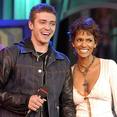 Justin Timberlake knew he was a lucky man standing next to Halle Berry during his November 2002 TRL performance.
Justin Timberlake knew he was a lucky man standing next to Halle Berry during his November 2002 TRL performance.