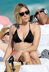 Pictures of Chloë Sevigny Sunbathing in a Black Bikini in South Beach