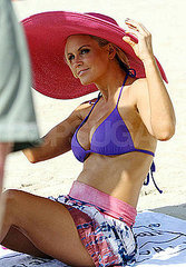 Pictures of Jenny McCarthy Wearing a Purple Bikini on a Cruise Pictures of Jenny McCarthy Wearing a Purple Bikini on a Cruise