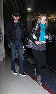 Pictures of Emily Blunt at LAX with JHusband John Krasinksi