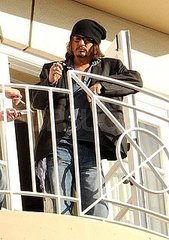 Pictures of Johnny Depp on Balcony of Four Seasons Hotel in LA Pictures of Johnny Depp on Balcony of Four Seasons Hotel in LA