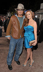 Pictures of Johnny Depp and Isla Fisher at the Rango Premiere in LA 2011-02-15 10:53:25