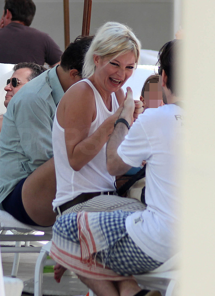 Kate Moss Gives the Thumbs Up to Her New Lighter Hair Colour in Rio Kate Moss Gives the Thumbs Up to Her New Lighter Hair Colour in Rio