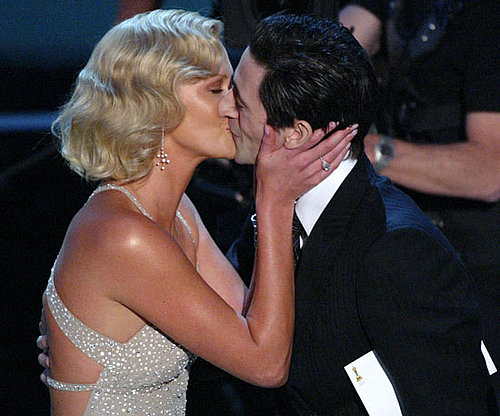 Charlize Theron planted a big kiss on Adrien Brody at the 2004 show.
Charlize Theron planted a big kiss on Adrien Brody at the 2004 show.