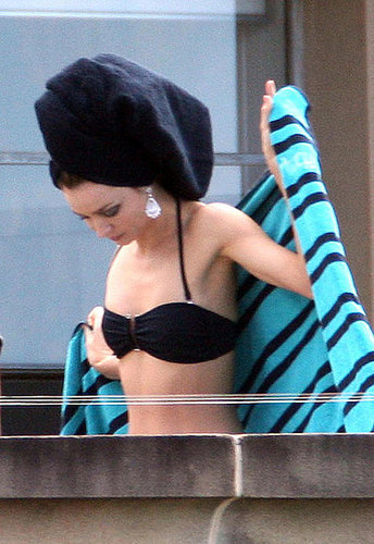 Miranda Kerr kept her hair out of the wind on a balcony at the Contemporary Art in The Rocks in Sydney during a fashion shoot for Grazia in October 2009.
Miranda Kerr kept her hair out of the wind on a balcony at the Contemporary Art in The Rocks in Sydney during a fashion shoot for Grazia in October 2009.