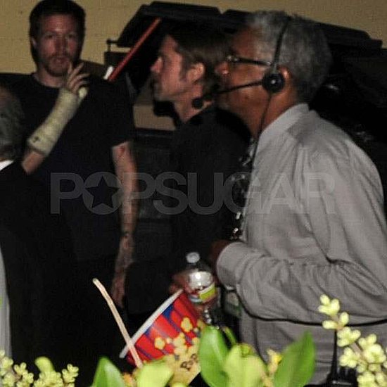 Brad Pitt Catches a Concert While Angelina Jolie Models in Cambodia Brad Pitt Catches a Concert While Angelina Jolie Models in Cambodia