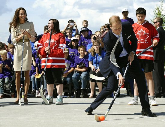 Prince William let loose as he swung a street-hockey stick. Prince William let loose as he swung a street-hockey stick.