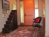 Front entry with bear chair