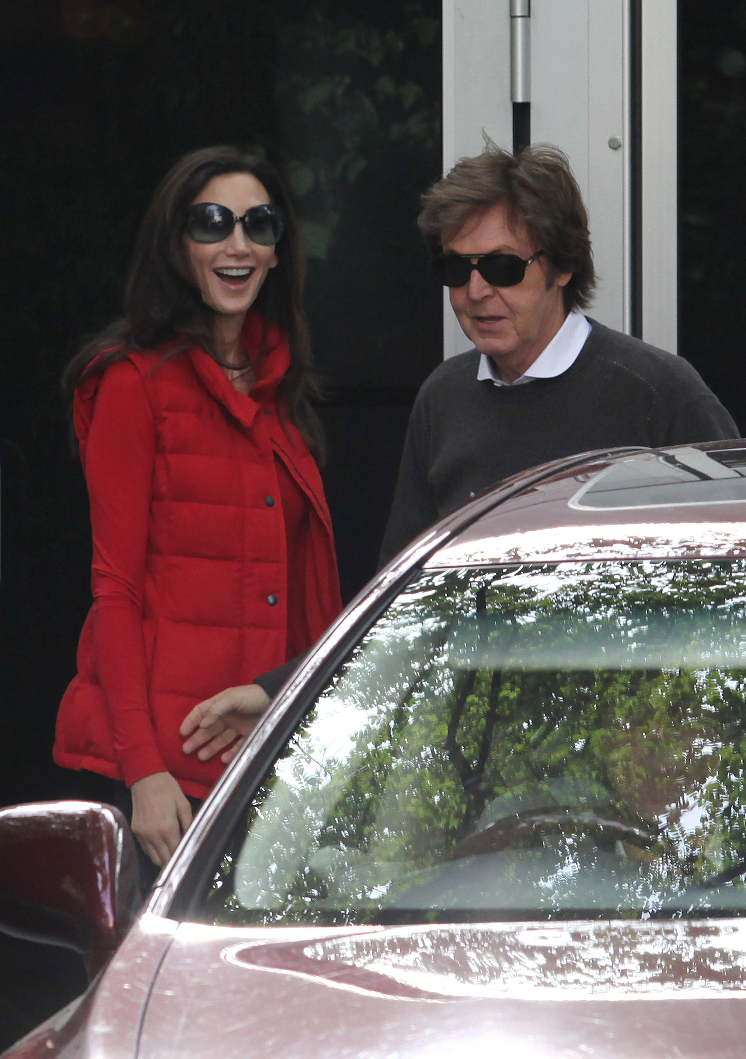Nancy Shevell and Paul McCartney leave home for their honeymoon. Nancy Shevell and Paul McCartney leave home for their honeymoon.