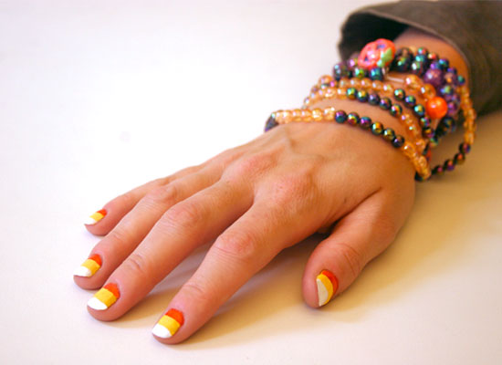 Nail It This Halloween With a Candy Corn Manicure Nail It This Halloween With a Candy Corn Manicure