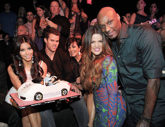 Kim Kardashian posed with her cake, as well as Kris Humphries, Kris Jenner, Khloe Kardashian, and Lamar Odom. Kim Kardashian posed with her cake, as well as Kris Humphries, Kris Jenner, Khloe Kardashian, and Lamar Odom.