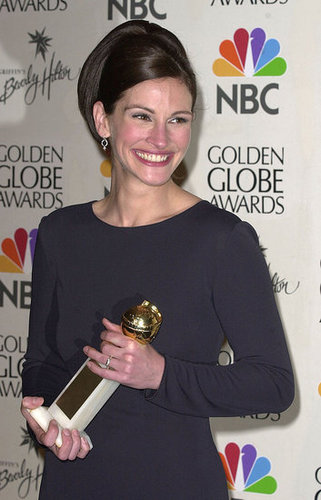 Julia Roberts showed her megawatt smile after winning a Golden Globe in 2001.
Julia Roberts showed her megawatt smile after winning a Golden Globe in 2001.