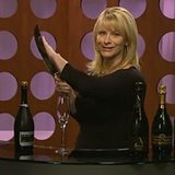 Leslie Sbrocco Sabers a Champagne Bottle