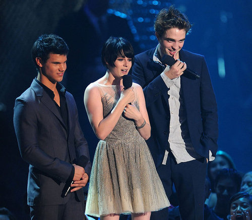 Robert Pattinson and Kristen Stewart stood on stage with Taylor Lautner at the September 2009 VMAs in NYC.
Robert Pattinson and Kristen Stewart stood on stage with Taylor Lautner at the September 2009 VMAs in NYC.