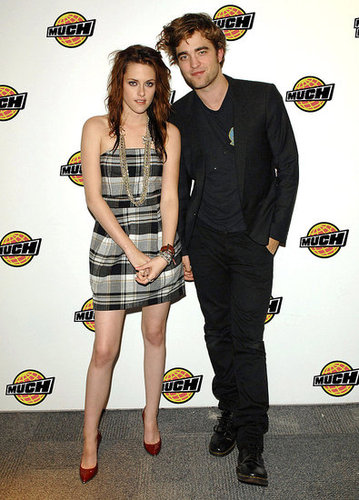 Robert Pattinson and Kristen Stewart stuck together during a visit to Toronto in November 2008.
Robert Pattinson and Kristen Stewart stuck together during a visit to Toronto in November 2008.