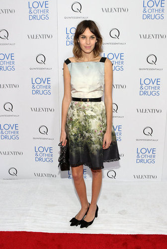 Her soft, printed Valentino and Louis Vuitton heels make a perfect pair for evening.
Her soft, printed Valentino and Louis Vuitton heels make a perfect pair for evening.
