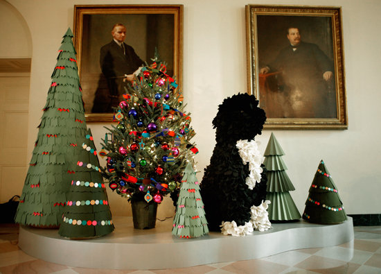 Deck the halls with boughs and . . . Bo? The family pooch took center stage at a reception for military families at which the first lady revealed this year's amazing holiday decorations. The Bo replicas came in all sizes and materials: from tiny dogs made of buttons to life-sized models crafted from felt and garbage bags.
Source: Getty Images
Deck the halls with boughs and . . . Bo? The family pooch took center stage at a reception for military families at which the first lady revealed this year's amazing holiday decorations. The Bo replicas came in all sizes and materials: from tiny dogs made of buttons to life-sized models crafted from felt and garbage bags.
Source: Getty Images