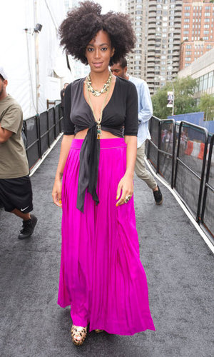 For a fun daytime look that shows a bit of skin, see how Solange does it: she paired a vibrant maxi skirt with a black, tied-up top and leopard-print heels, making for a sexy, attention-getting ensemble in September 2011.
For a fun daytime look that shows a bit of skin, see how Solange does it: she paired a vibrant maxi skirt with a black, tied-up top and leopard-print heels, making for a sexy, attention-getting ensemble in September 2011.