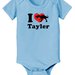 Valentine's Day Dinosaur Baby Onesie ($17)