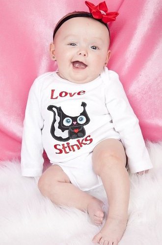 Love Stinks Onesie ($18) Love Stinks Onesie ($18)