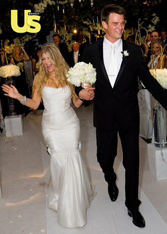For her January 2009 LA wedding to Josh Duhamel, Fergie showed off her figure in a custom-made gown by Dolce & Gabbana.
For her January 2009 LA wedding to Josh Duhamel, Fergie showed off her figure in a custom-made gown by Dolce & Gabbana.