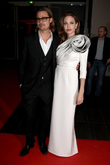 Angelina Jolie and Brad Pitt at the Paris premiere of In the Land of Blood and Honey. Angelina Jolie and Brad Pitt at the Paris premiere of In the Land of Blood and Honey.