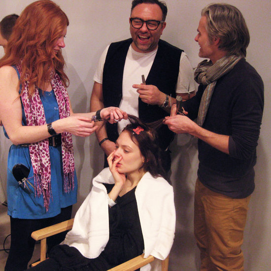 Neil With A Model and His Team Members