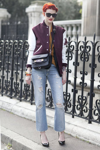 She wears the athletic trend like a champ, thanks to a shrunken (read: not too literal) varsity jacket juxtaposed with posh pumps.
She wears the athletic trend like a champ, thanks to a shrunken (read: not too literal) varsity jacket juxtaposed with posh pumps.