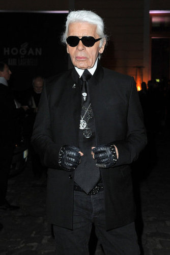 Karl Lagerfeld showed off his signature uniform at his Hogan presentation — we love the studded gloves.
Karl Lagerfeld showed off his signature uniform at his Hogan presentation — we love the studded gloves.