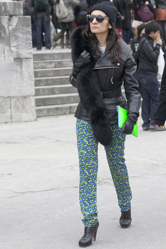 Printed pants and a neon clutch are key to pumped-up style.
Printed pants and a neon clutch are key to pumped-up style.