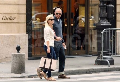 The couple walked around the streets of Paris during a July 2011 trip.
The couple walked around the streets of Paris during a July 2011 trip.