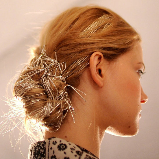 Stylist par excellence Kristin Ess scored some major repins when she put up a photo of this woven bun from the Spring/Summer 2010 Carolina Herrera show.
Stylist par excellence Kristin Ess scored some major repins when she put up a photo of this woven bun from the Spring/Summer 2010 Carolina Herrera show.
