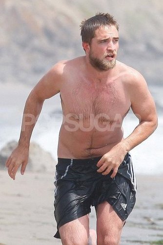 Robert Pattinson went shirtless with a beard.
Robert Pattinson went shirtless with a beard.