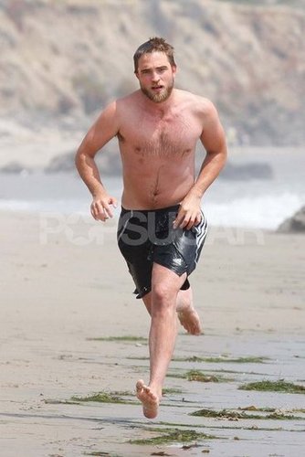 Robert Pattinson went running shirtless on the beach.
Robert Pattinson went running shirtless on the beach.