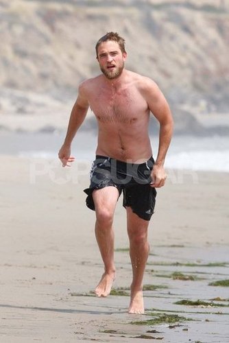 Robert Pattinson went running shirtless on the beach.
Robert Pattinson went running shirtless on the beach.