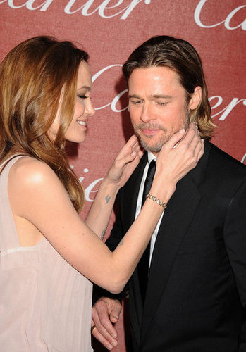 Angelina Jolie cozied close to Brad Pitt at the January 2010 Palm Springs Film Festival Awards.
Angelina Jolie cozied close to Brad Pitt at the January 2010 Palm Springs Film Festival Awards.