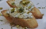 Herbed Ricotta and Pistachio Crostini with Honey